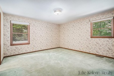 Don't miss this opportunity to own a well-maintained property on on Grand Haven Golf Club in Michigan - for sale on GolfHomes.com, golf home, golf lot