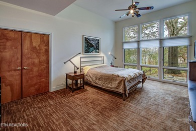 You enter this lovely home through its handsome double doors and on Tanasi Golf Course in Tennessee - for sale on GolfHomes.com, golf home, golf lot