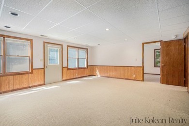 Don't miss this opportunity to own a well-maintained property on on Grand Haven Golf Club in Michigan - for sale on GolfHomes.com, golf home, golf lot