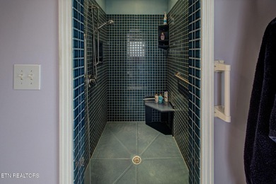 You enter this lovely home through its handsome double doors and on Tanasi Golf Course in Tennessee - for sale on GolfHomes.com, golf home, golf lot