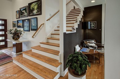 You enter this lovely home through its handsome double doors and on Tanasi Golf Course in Tennessee - for sale on GolfHomes.com, golf home, golf lot