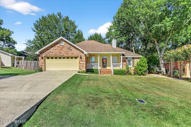 Beautifully maintained and move-in ready on a quiet Diamondhead on Diamondhead Country Club in Mississippi - for sale on GolfHomes.com, golf home, golf lot