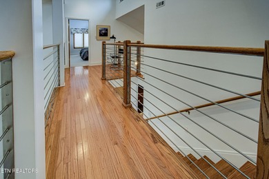 You enter this lovely home through its handsome double doors and on Tanasi Golf Course in Tennessee - for sale on GolfHomes.com, golf home, golf lot