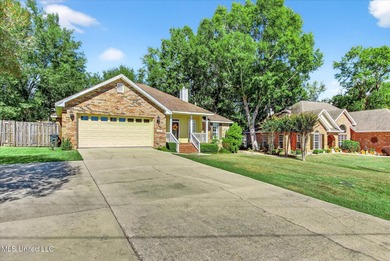 Beautifully maintained and move-in ready on a quiet Diamondhead on Diamondhead Country Club in Mississippi - for sale on GolfHomes.com, golf home, golf lot