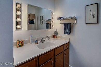 You enter this lovely home through its handsome double doors and on Tanasi Golf Course in Tennessee - for sale on GolfHomes.com, golf home, golf lot