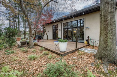 You enter this lovely home through its handsome double doors and on Tanasi Golf Course in Tennessee - for sale on GolfHomes.com, golf home, golf lot