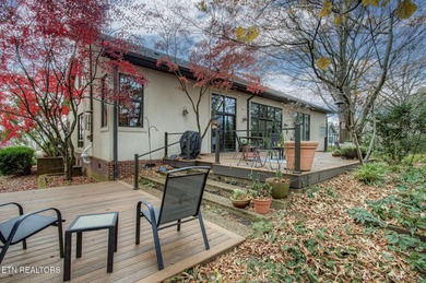 You enter this lovely home through its handsome double doors and on Tanasi Golf Course in Tennessee - for sale on GolfHomes.com, golf home, golf lot