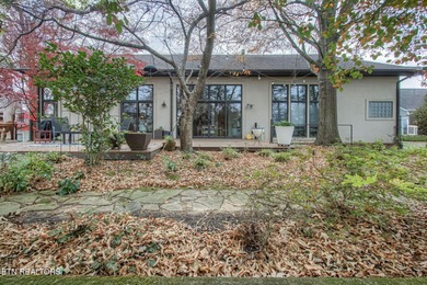 You enter this lovely home through its handsome double doors and on Tanasi Golf Course in Tennessee - for sale on GolfHomes.com, golf home, golf lot