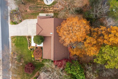 You enter this lovely home through its handsome double doors and on Tanasi Golf Course in Tennessee - for sale on GolfHomes.com, golf home, golf lot