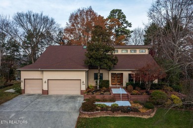 You enter this lovely home through its handsome double doors and on Tanasi Golf Course in Tennessee - for sale on GolfHomes.com, golf home, golf lot