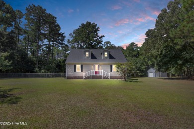 Beautiful 3-bedroom, 2-bathroom home tucked away on nearly an on Minnesott Golf and Country Club in North Carolina - for sale on GolfHomes.com, golf home, golf lot