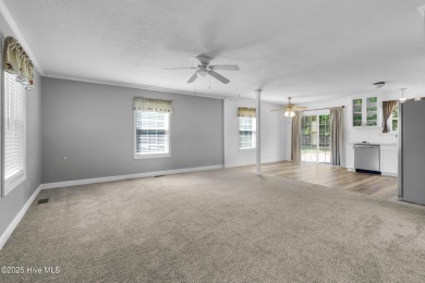 Beautiful 3-bedroom, 2-bathroom home tucked away on nearly an on Minnesott Golf and Country Club in North Carolina - for sale on GolfHomes.com, golf home, golf lot