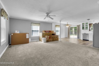 Beautiful 3-bedroom, 2-bathroom home tucked away on nearly an on Minnesott Golf and Country Club in North Carolina - for sale on GolfHomes.com, golf home, golf lot