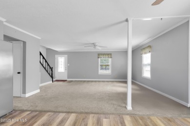 Beautiful 3-bedroom, 2-bathroom home tucked away on nearly an on Minnesott Golf and Country Club in North Carolina - for sale on GolfHomes.com, golf home, golf lot