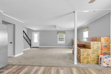 Beautiful 3-bedroom, 2-bathroom home tucked away on nearly an on Minnesott Golf and Country Club in North Carolina - for sale on GolfHomes.com, golf home, golf lot