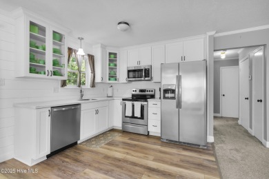 Beautiful 3-bedroom, 2-bathroom home tucked away on nearly an on Minnesott Golf and Country Club in North Carolina - for sale on GolfHomes.com, golf home, golf lot