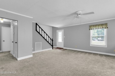 Beautiful 3-bedroom, 2-bathroom home tucked away on nearly an on Minnesott Golf and Country Club in North Carolina - for sale on GolfHomes.com, golf home, golf lot