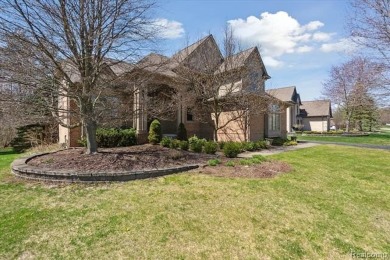Step into this stunning 4-bedroom brick colonial located in the on Oakhurst Golf and Country Club in Michigan - for sale on GolfHomes.com, golf home, golf lot