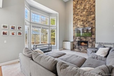 Step into this stunning 4-bedroom brick colonial located in the on Oakhurst Golf and Country Club in Michigan - for sale on GolfHomes.com, golf home, golf lot