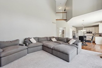 Step into this stunning 4-bedroom brick colonial located in the on Oakhurst Golf and Country Club in Michigan - for sale on GolfHomes.com, golf home, golf lot