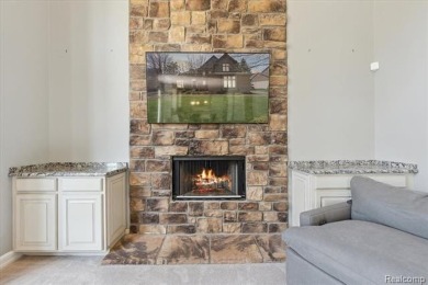 Step into this stunning 4-bedroom brick colonial located in the on Oakhurst Golf and Country Club in Michigan - for sale on GolfHomes.com, golf home, golf lot