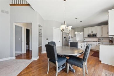 Step into this stunning 4-bedroom brick colonial located in the on Oakhurst Golf and Country Club in Michigan - for sale on GolfHomes.com, golf home, golf lot