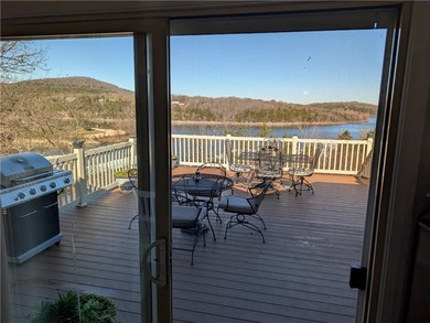 Enjoy stunning views of Table Rock Lake from the upper deck on Holiday Island Executive Golf Course in Arkansas - for sale on GolfHomes.com, golf home, golf lot