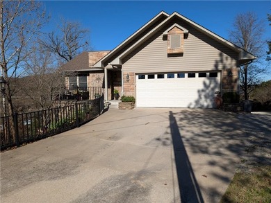 Enjoy stunning views of Table Rock Lake from the upper deck on Holiday Island Executive Golf Course in Arkansas - for sale on GolfHomes.com, golf home, golf lot