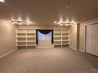 FABULOUS RANCHER WITH PARTIALLY FINISHED BASEMENT SHOWCASING AN on Desert Hawk At Pueblo West in Colorado - for sale on GolfHomes.com, golf home, golf lot