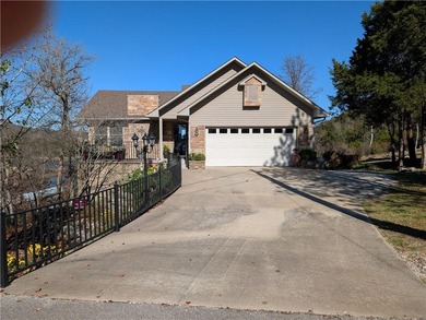 Enjoy stunning views of Table Rock Lake from the upper deck on Holiday Island Executive Golf Course in Arkansas - for sale on GolfHomes.com, golf home, golf lot