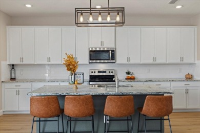 Discover the exquisite D.R. Horton's Jordyn Model home in the on Lakewood National Golf Club in Florida - for sale on GolfHomes.com, golf home, golf lot