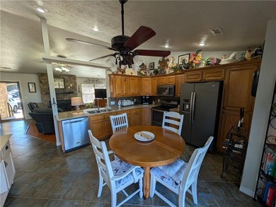 Enjoy stunning views of Table Rock Lake from the upper deck on Holiday Island Executive Golf Course in Arkansas - for sale on GolfHomes.com, golf home, golf lot