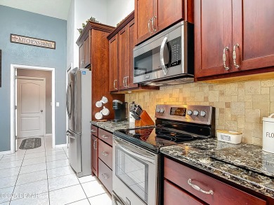 Nestled on the golf course and a quiet cul-de-sac, this stunning on The Golf Club At Cypress Head in Florida - for sale on GolfHomes.com, golf home, golf lot