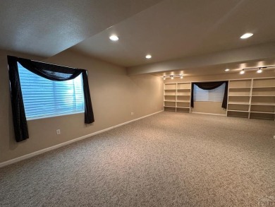FABULOUS RANCHER WITH PARTIALLY FINISHED BASEMENT SHOWCASING AN on Desert Hawk At Pueblo West in Colorado - for sale on GolfHomes.com, golf home, golf lot