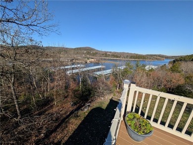 Enjoy stunning views of Table Rock Lake from the upper deck on Holiday Island Executive Golf Course in Arkansas - for sale on GolfHomes.com, golf home, golf lot
