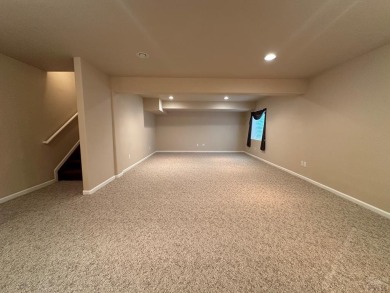 FABULOUS RANCHER WITH PARTIALLY FINISHED BASEMENT SHOWCASING AN on Desert Hawk At Pueblo West in Colorado - for sale on GolfHomes.com, golf home, golf lot
