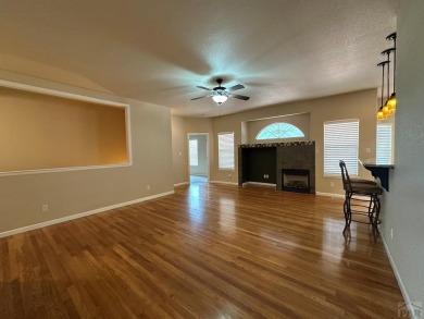 FABULOUS RANCHER WITH PARTIALLY FINISHED BASEMENT SHOWCASING AN on Desert Hawk At Pueblo West in Colorado - for sale on GolfHomes.com, golf home, golf lot