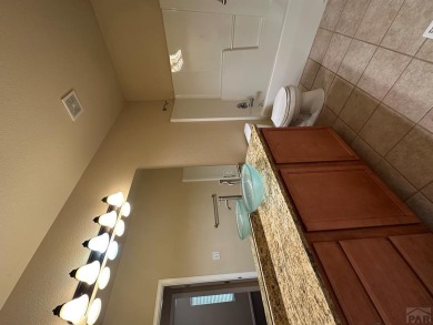 FABULOUS RANCHER WITH PARTIALLY FINISHED BASEMENT SHOWCASING AN on Desert Hawk At Pueblo West in Colorado - for sale on GolfHomes.com, golf home, golf lot