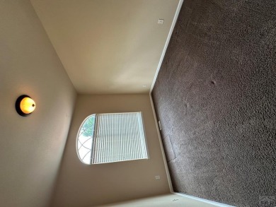 FABULOUS RANCHER WITH PARTIALLY FINISHED BASEMENT SHOWCASING AN on Desert Hawk At Pueblo West in Colorado - for sale on GolfHomes.com, golf home, golf lot