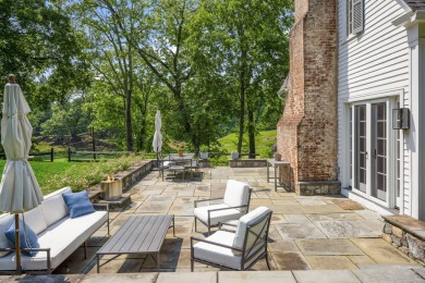 Picturesque Stanwich Colonial with golf course views, located on Greenwich Country Club in Connecticut - for sale on GolfHomes.com, golf home, golf lot