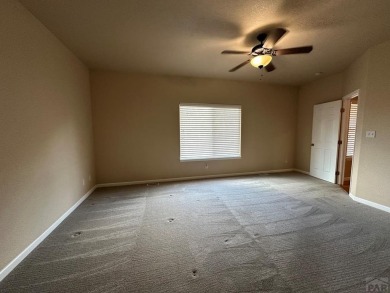 FABULOUS RANCHER WITH PARTIALLY FINISHED BASEMENT SHOWCASING AN on Desert Hawk At Pueblo West in Colorado - for sale on GolfHomes.com, golf home, golf lot