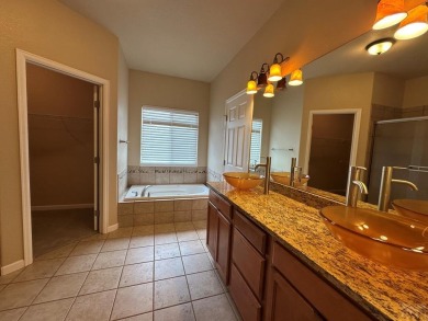 FABULOUS RANCHER WITH PARTIALLY FINISHED BASEMENT SHOWCASING AN on Desert Hawk At Pueblo West in Colorado - for sale on GolfHomes.com, golf home, golf lot