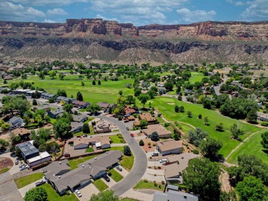 Enjoy stunning Monument and fairway views from this beautifully on Tiara Rado Golf Course in Colorado - for sale on GolfHomes.com, golf home, golf lot