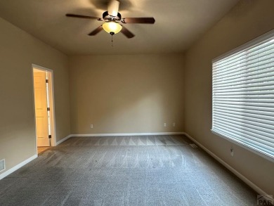 FABULOUS RANCHER WITH PARTIALLY FINISHED BASEMENT SHOWCASING AN on Desert Hawk At Pueblo West in Colorado - for sale on GolfHomes.com, golf home, golf lot