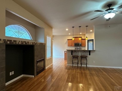 FABULOUS RANCHER WITH PARTIALLY FINISHED BASEMENT SHOWCASING AN on Desert Hawk At Pueblo West in Colorado - for sale on GolfHomes.com, golf home, golf lot