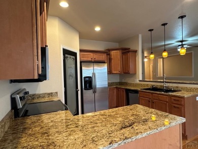 FABULOUS RANCHER WITH PARTIALLY FINISHED BASEMENT SHOWCASING AN on Desert Hawk At Pueblo West in Colorado - for sale on GolfHomes.com, golf home, golf lot