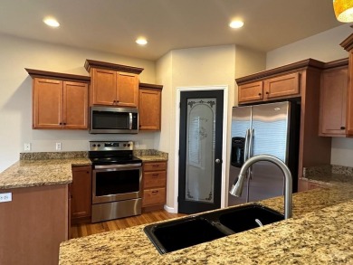 FABULOUS RANCHER WITH PARTIALLY FINISHED BASEMENT SHOWCASING AN on Desert Hawk At Pueblo West in Colorado - for sale on GolfHomes.com, golf home, golf lot
