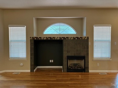 FABULOUS RANCHER WITH PARTIALLY FINISHED BASEMENT SHOWCASING AN on Desert Hawk At Pueblo West in Colorado - for sale on GolfHomes.com, golf home, golf lot