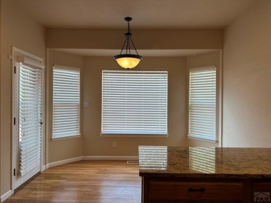 FABULOUS RANCHER WITH PARTIALLY FINISHED BASEMENT SHOWCASING AN on Desert Hawk At Pueblo West in Colorado - for sale on GolfHomes.com, golf home, golf lot