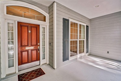 This gracious, charming pool home with large wrap around porch on Haile Plantation Golf and Country Club in Florida - for sale on GolfHomes.com, golf home, golf lot